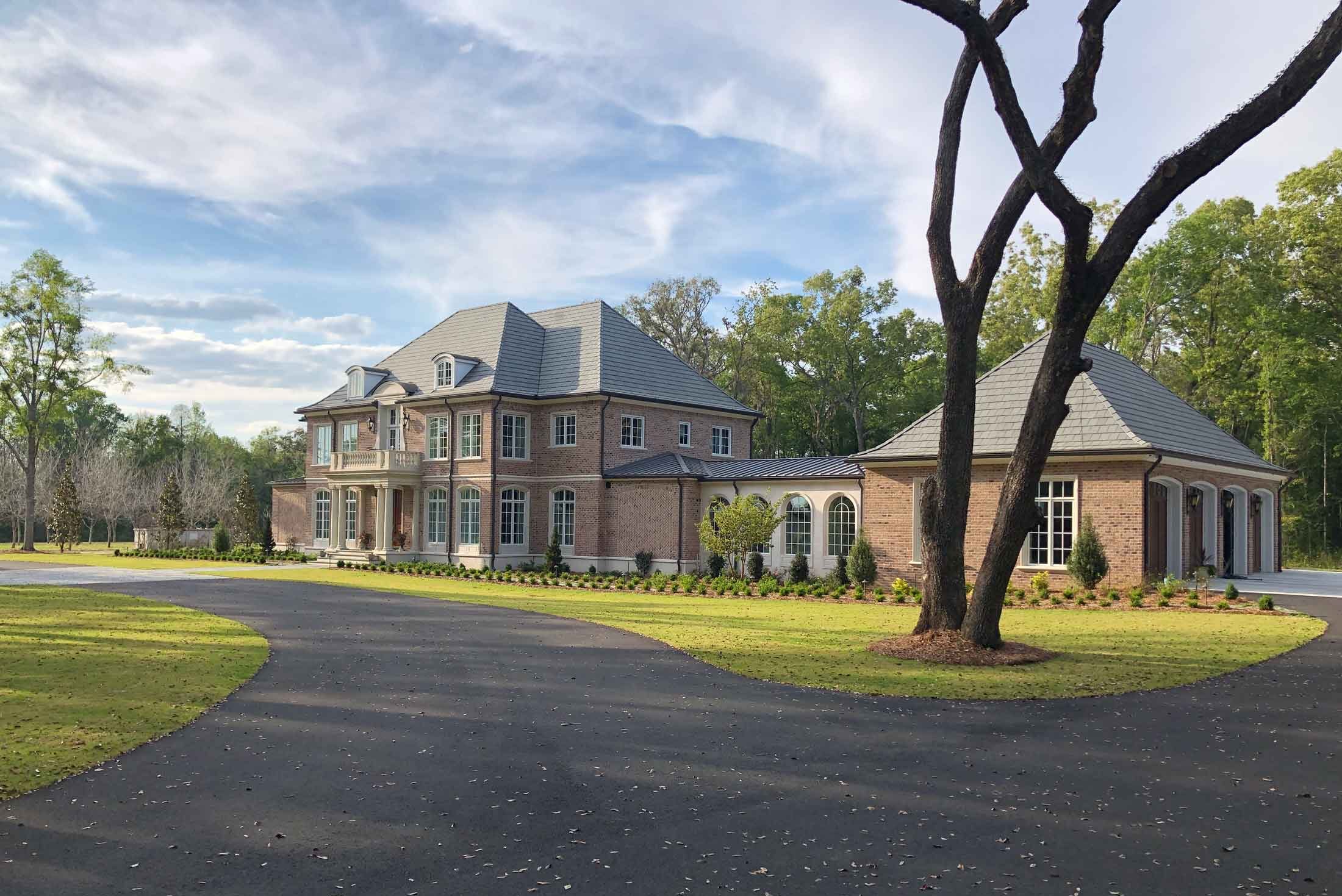 A home, with a driveway paved by Reames Concrete Company